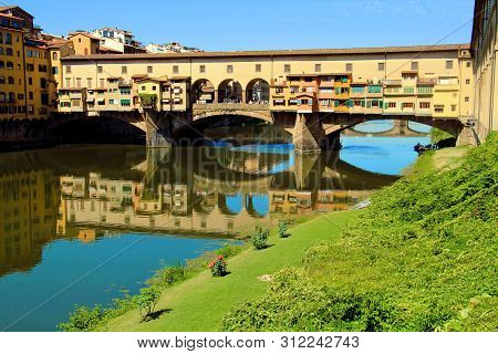 Florence, Italy 08 09 2017 -amous Landmark Ponte Vecchio In Florence Over Arno River.