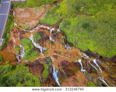 Aerial View Of Golden Waterfall. Nature Landscape Of Jinguashi In Ruifang Area. It Is Located In New