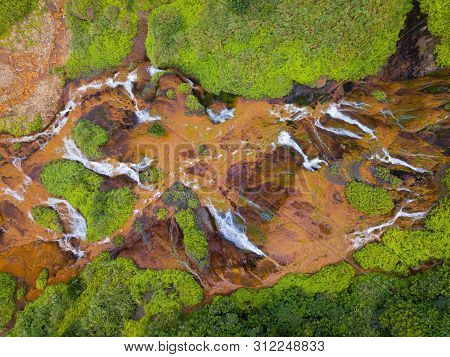 Aerial View Of Golden Waterfall. Nature Landscape Of Jinguashi In Ruifang Area. It Is Located In New
