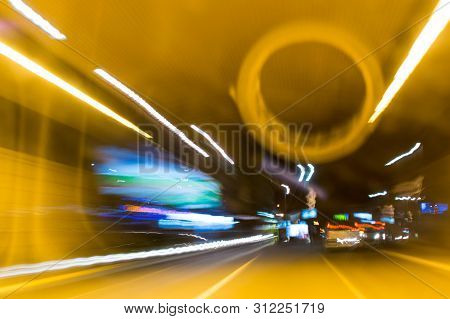 A View Through The Windshield While Driving At Night. Long Exposure. Artistic, Abstract.