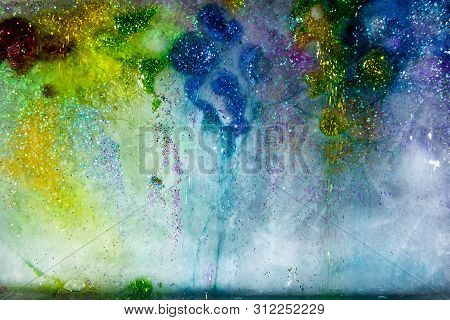Colored Ice With Glitter, Melting. Multi Color Shining.