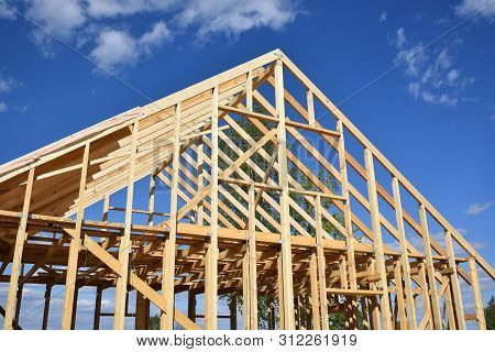 Wood Frame Residential Building Under Construction.building Construction, Wood Framing Structure At