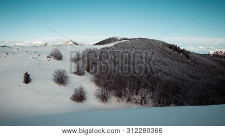 Landscape View Of A Mountain And Dark Forest On The Velebit Mountain. Winter In Velebit, Croatia, Eu