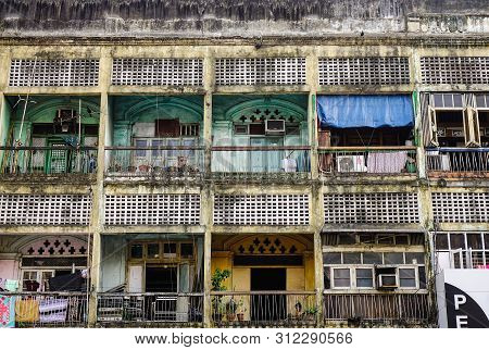 Yangon, Myanmar - Feb 13, 2017. Old Apartments At Chinatown In Yangon, Myanmar. Yangon Has The Highe