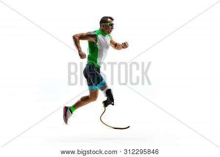 Athlete With Disabilities Or Amputee Isolated On White Studio Background. Professional Male Runner W