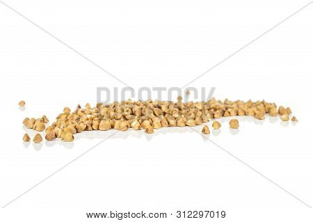 Lot Of Whole Raw Brown Buckwheat Grain In Line Isolated On White Background