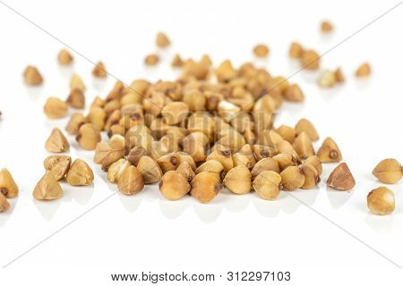 Lot Of Whole Raw Brown Buckwheat Grain Isolated On White Background