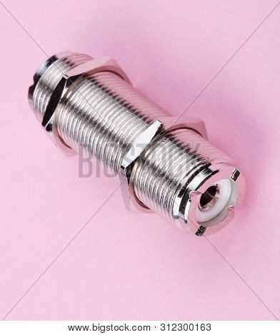 Radio Connector On Pink Background At Dry Sunny Summer Day