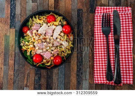 cereal specialties cooked with salad, roasted chicken aiguillette cured with salted and bacon
