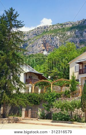Montenegro. View Of  Lower Ostrog Monastery, View Of Upper Ostrog Monastery On The Mountainside