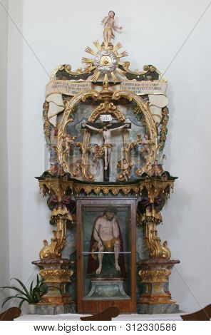 KLOSTAR IVANIC, CROATIA - SEPTEMBER 25, 2011: Altar of the Holy Cross in the Church of the Assumption of the Virgin Mary in Klostar Ivanic, Croatia