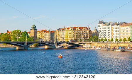 Masaryk Embankment With And Sitkovska Water Tower Palacky Bridge Over Vltava River In Prague City Ce