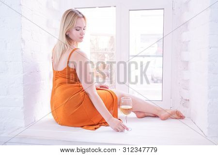 Pretty Plus Size Caucasian Woman Drink Wine In The Morning Alone At Home