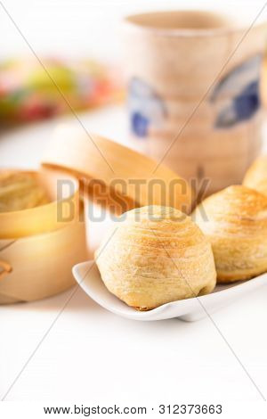 Oriental Food Concept Homemade Organic Huaiyang Spiral Chinese Flaky  Pastry Moon Cake On White Back