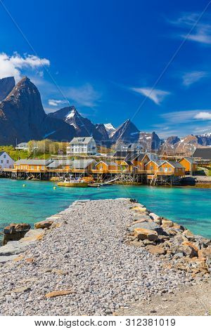 Hamnoy Village on the Lofoten Islands, Reinefjord,  Norway. Panoramic Shot,  Mountain In Background