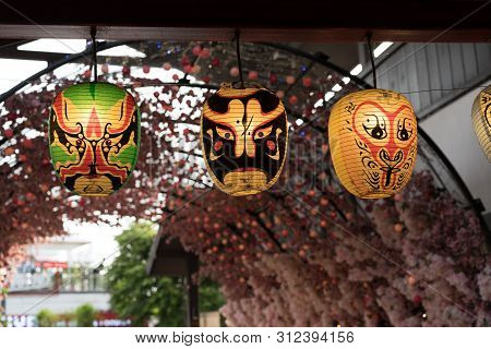 Japanese Kabuki Noh Mask Lamp In Flower Background