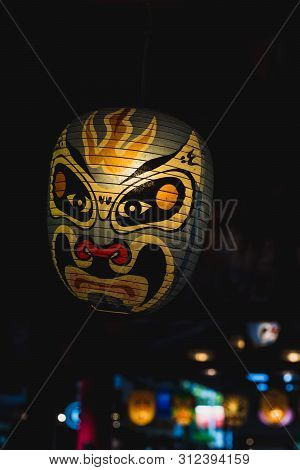 Japanese Kabuki Noh Mask Lamp In Dark Background