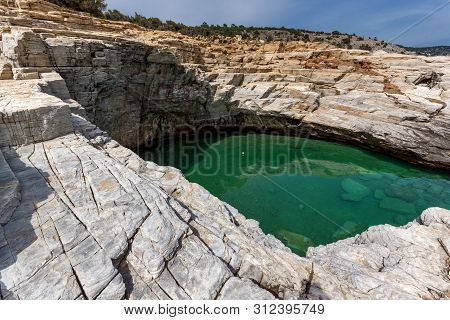 Seascape With Green Waters Of Giola Natural Pool In Thassos Island, East Macedonia And Thrace, Greec