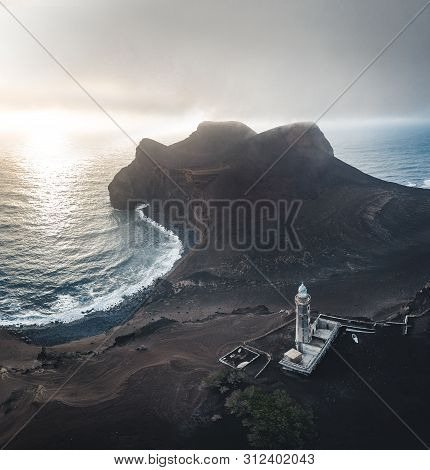 View Over Capelinhos Volcano, Lighthouse Of Ponta Dos Capelinhos On Western Coast On Faial Island, A