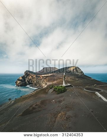 View Over Capelinhos Volcano, Lighthouse Of Ponta Dos Capelinhos On Western Coast On Faial Island, A
