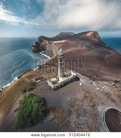 View Over Capelinhos Volcano, Lighthouse Of Ponta Dos Capelinhos On Western Coast On Faial Island, A