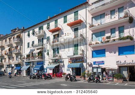 Porto Santo Stefano, Italy - September 22, 2013: Street With Shops And Cafes In Porto Santo Stefano 