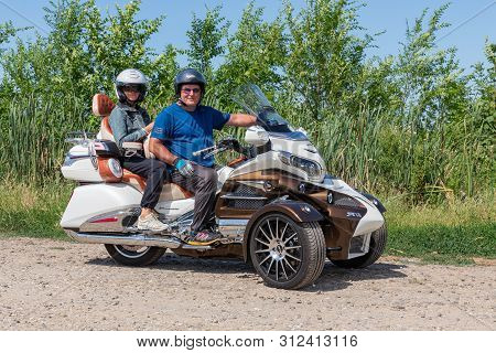 Eger, Hungary - July 04, 2019: Motor Bikers At Tricycle Honda Goldwing Making A Drive Through Hungar