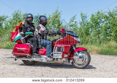 Eger, Hungary - July 04, 2019: Motor Bikers At Red Honda Goldwing Making A Drive Through Hungary Bet