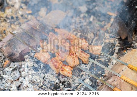 Grilled Shish Kebab On Skewer. Roasted Beef Meat Cooked At Barbecue. Traditional Eastern Dish Shashl
