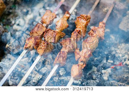 Grilled Shish Kebab On Skewer. Roasted Beef Meat Cooked At Barbecue. Traditional Eastern Dish Shashl