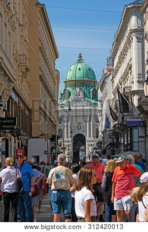 Vienna, Austria - July 20, 2019: Large Group Of Tourists Like To Visit The Pedestrian Zone Kohlmarkt