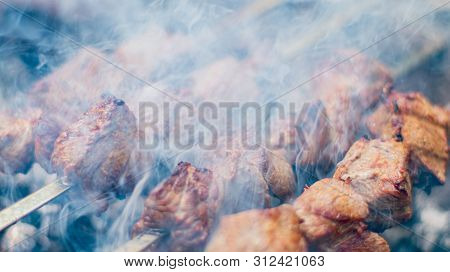Grilled Shish Kebab On Skewer. Roasted Beef Meat Cooked At Barbecue. Traditional Eastern Dish Shashl
