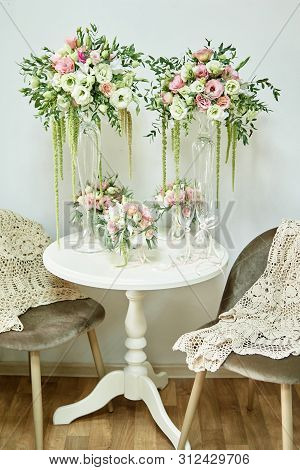 Luxury Floral Arrangement Of Pink And White Flowers In Glass Vases On Wood Table, Copy Space. Weddin