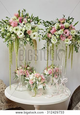 Luxury Floral Arrangement Of Pink And White Flowers In Glass Vases On Wood Table, Copy Space. Weddin