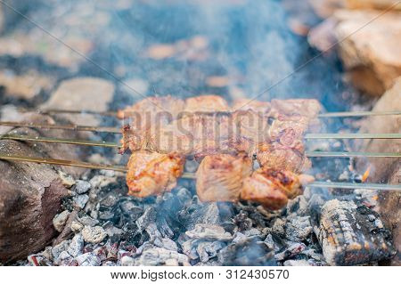 Grilled Shish Kebab On Skewer. Roasted Beef Meat Cooked At Barbecue. Traditional Eastern Dish Shashl