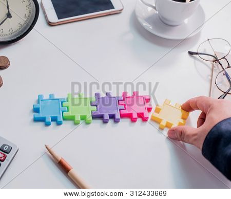 Successful Concept And Goal. Business Development And Improvement. Puzzle And Jigsaw.