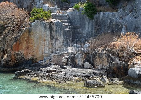 The Ruins Of The City Of Mira, Kekova, An Ancient Megalithic City Destroyed By An Earthquake.