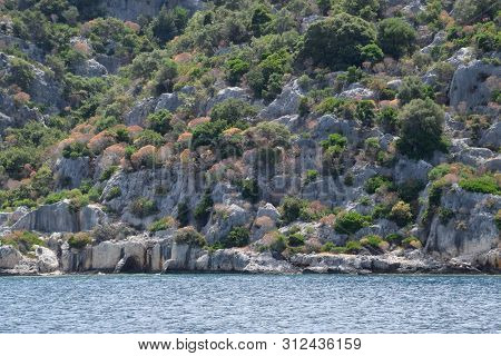 The Ruins Of The City Of Mira, Kekova, An Ancient Megalithic City Destroyed By An Earthquake.