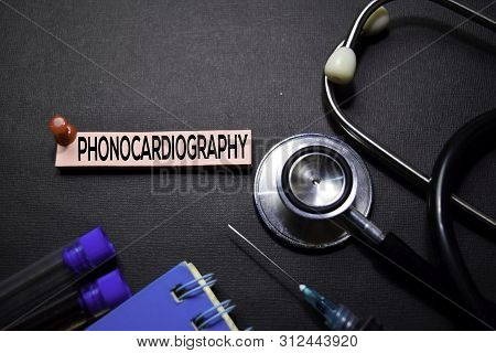Phonocardiography Text On Sticky Notes. Top View Isolated On Black Background. Healthcare/medical Co