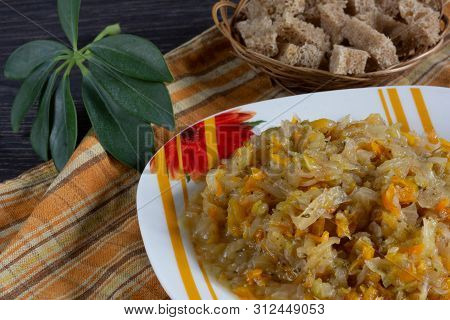 Stewed Cabbage With Carrot And Onion On Plate