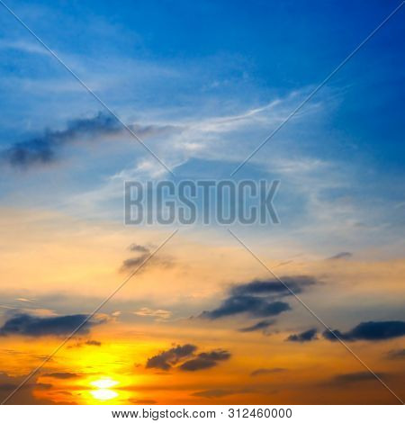 Cloudy Sky And Bright Sun Rise Over The Horizon.