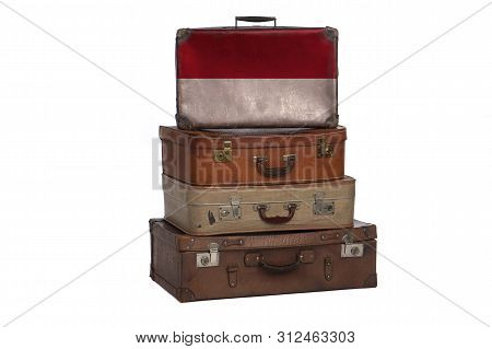 Monaco, Monacan Travel Concept. Group Of Vintage Suitcases Isolated On White Background