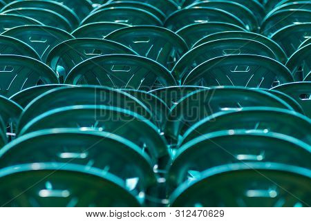Bucharest, Romania - June 23, 2019: Green Plastic Chairs Are Placed In Izvor Park For Spectators Who
