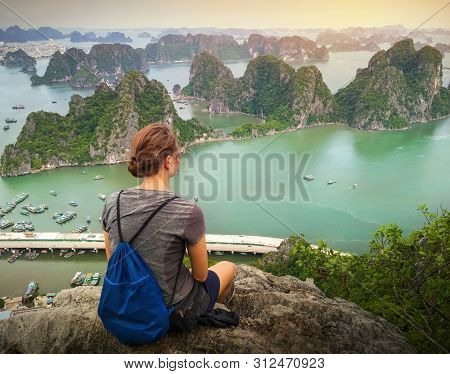 Girls Sitting On A Mountains Enjoying View Of Beautiful Limestone Mountains In Clear Azure Sea With 