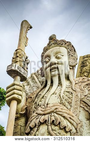 Chinese Guard Statue In Wat Pho Buddhist Temple, Bangkok, Thailand