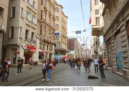 Istanbul, Turkey - May 15, 2019: Pedestrian Tourist Street Istiklal. Istiklal Street Is The Most Pop