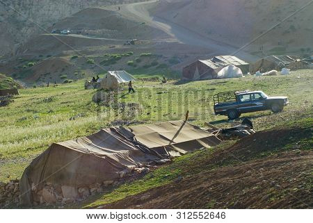 Circa Isfahan, Iran - June 22, 2007: Bakhtiari Nomadic People Camp At Sunset Circa Isfahan, Iran. So