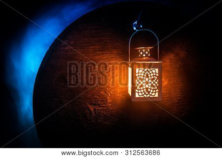 Arabic Lantern With Candle At Night For Islamic Holiday. Muslim Holy Month Ramadan. The End Of Eid A
