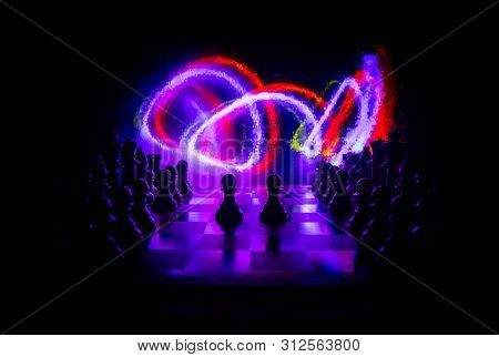 Chess Board Game Concept Of Business Ideas And Competition. Chess Figures On A Dark Background With