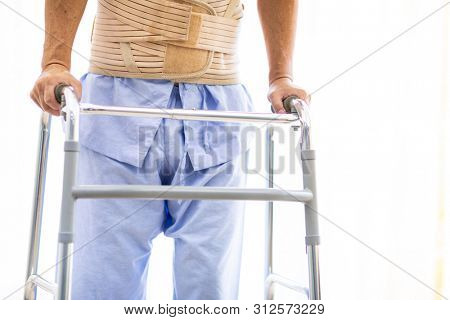 closeup of  elderly using adult walker in hospital 